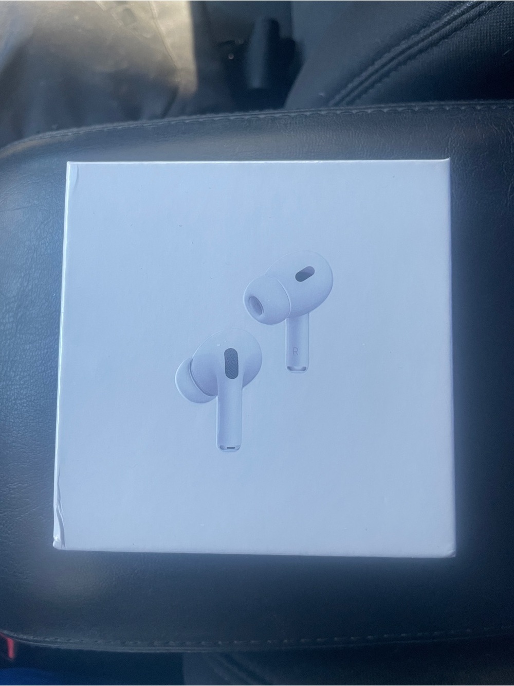 White Wireless Earbuds in Retail Box